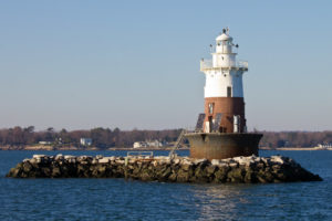 Greens Ledge Lighthouse with the Darien neighborhood of Tokeneke in the background